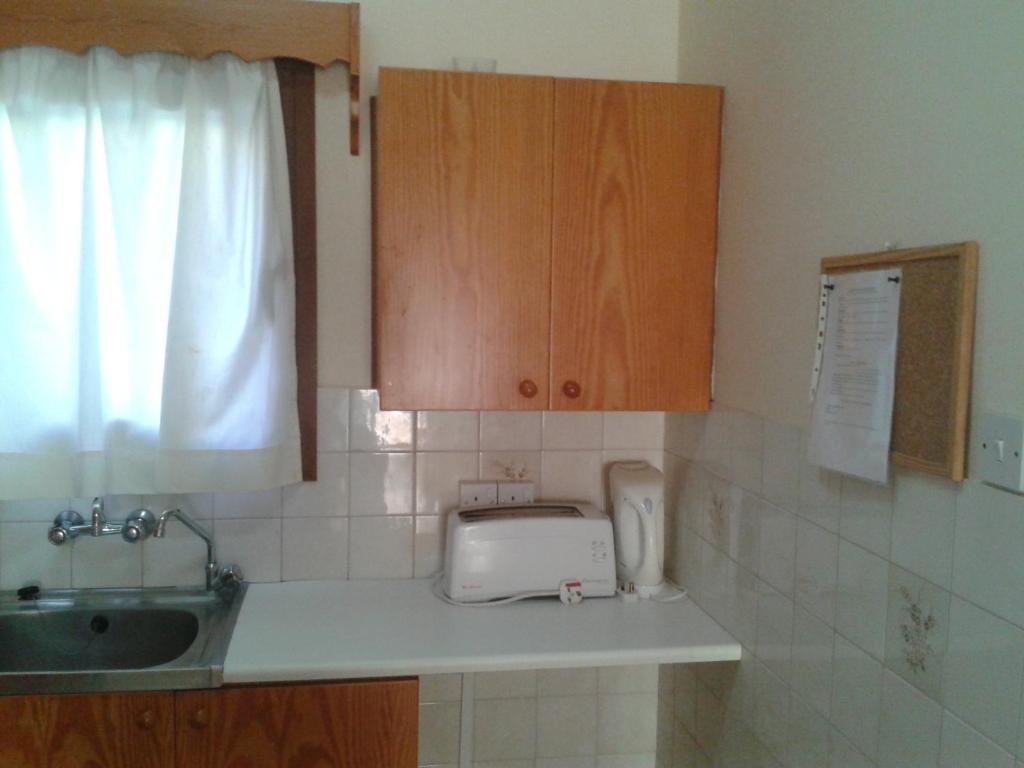Pelekanos Apartments Писсури Номер фото